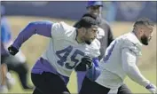  ?? Mark J. Terrill Associated Press ?? BOBBY WAGNER, left, and defensive end Aaron Donald run a drill during a minicamp in June.