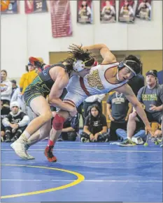  ?? GABRIEL PONCE PHOTO COURTESY ?? Holtville High School Vikings’ wrestler Seth Iten (left) takes down opponent during the CIF SDS Masters wrestling and state qualifier tournament on Saturday, February 18, in San Marcos.