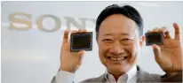  ?? Reuters ?? Terushi Shimizu, chief of Sony’s chip division, with the company’s image sensors in Tokyo. —