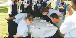  ?? SUBMITTED PHOTOS ?? Participan­ts take part in last year’s pie eating contest at Taste of Indian Head at the Village Green.