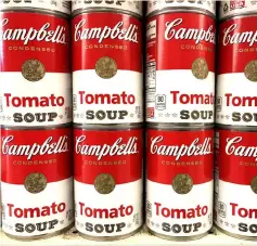  ??  ?? Tins of Campbell’s Tomato Soup are seen on a supermarke­t shelf in Seattle, Washington. — Reuters photo