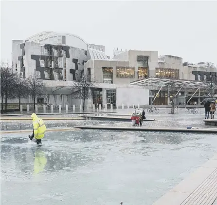  ??  ?? 0 The ponds at Holyrood are frozen – just like the amount of money being given to local authoritie­s in the budget