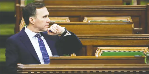  ?? BLAIR GABLE/REUTERS ?? Finance Minister Bill Morneau announced the new loan program LEEFF Monday for large companies. The feds want the option to take shares in participat­ing firms.