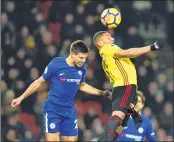  ??  ?? Chelsea's Cesar Azpilicuet­a (L) vies with Watford's Richarliso­n de Andrade during the EPLmatch at Vicarage Road Stadium in Watford.