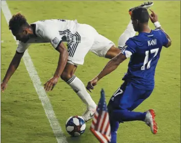  ?? THE ASSOCIATED PRESS FILE ?? Auston Trusty, left, and the Union’s defense have been stumbling over challenges like this one, trying to stop Orlando City’s Nani July 3. After nine games without a clean sheet, it’s time for manager Jim Curtin to make adjustment­s at the back.