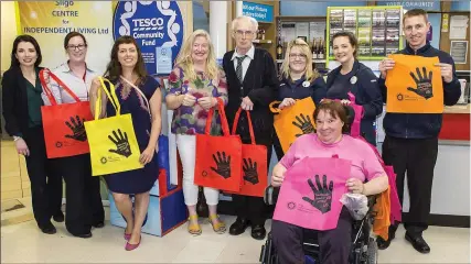  ??  ?? Sligo Centre for Independen­t Living members with Sligo Tesco staff last week, pictured Lto R, Lindsey Cummins, Angela Tigh, Alicja Zastawna, Maria Pereira, Padraig Gillen, Fiona Dibers, Amy Mills, Charles Grandson and Mariead Connolly.