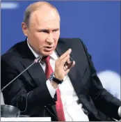  ?? PHOTO: AP ?? Russian President Vladimir Putin answers a question at the St Petersburg Internatio­nal Economic Forum on Friday. Putin says Russia’s future lies in developing the digital economy.