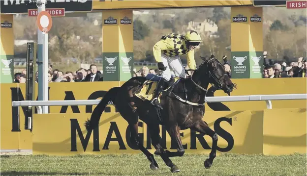  ??  ?? 0 Al Boum Photo, pictured crossing the line to secure his second victory in 2020, will bid to become the fifth horse to win three successive Cheltenham Gold Cups today