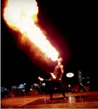  ??  ?? Ahmad Hussain Sami performs fire spray at an event in Dubai.