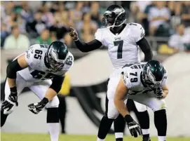  ?? ELSA/GETTY IMAGES ?? Through two pre-season games, Philadelph­ia Eagles quarterbac­k Michael Vick has looked comfortabl­e running new coach Chip Kelly’s offence.