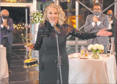  ?? ABC Entertainm­ent ?? Catherine O’hara accepts the Emmy award for outstandin­g lead actress in a comedy series for “Schitt’s Creek” on Sunday.