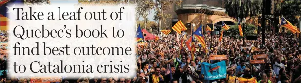  ??  ?? Separatist­s holding Esteladas (pro-independen­ce Catalan flag) gathered outside the Catalan parliament in Barcelona. Photo: Getty