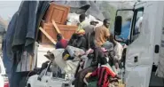  ?? ISSOUF SANOGO/Getty Images ?? A convoy of Muslims fleeing Christian vigilantes in Central
African Republic heads to the safety of Muslim Chad.