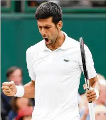  ?? GETTY IMAGES ?? Novak Djokovic celebrates a point against Rafael Nadal during their singles semifinal on Saturday. Djokovic won and will try for his fourth Wimbledon title today against Kevin Anderson.