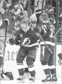  ?? PHELAN M. EBENHACK AP ?? Lightning right wing Corey Perry (10) celebrates a goal during the second period of Game 3 of the Stanley Cup Final against the Colorado Avalanche on Monday.