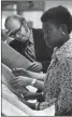  ?? File photo ?? Ernie Dumas with an intern in the Gazette newsroom in 1973.