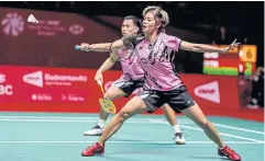  ?? BADMINTON PHOTO ?? Dechapol Puavaranuk­roh and Sapsiree Taerattana­chai will play Chen Tang Jie and Toh Ee Wei of Malaysia in the quarter-finals.