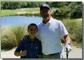  ?? PHOTOS PROVIDED ?? Davis Conaway, 12, posin for a picture with his dad, Jeremi, is the most accomplish­ed golfer in his age group in the entire Philadelph­ia PGA Section.
