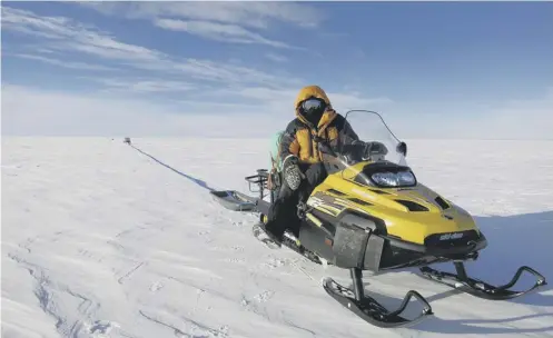  ??  ?? 0 A snowmobile towed the radar survey probe across Pine Island Glacier in west Antarctica