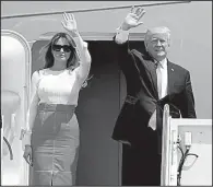  ?? AP/ALEX BRANDON ?? President Donald Trump and first lady Melania Trump board Air Force One on Friday at Andrews Air Force Base en route to the Middle East.