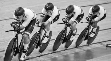  ??  ?? Australian cycling team compete in the men’s team pursuit final. — AFP photo
