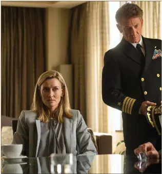  ??  ?? Natascha McElhone as Laz Ingram, with Sean Penn as Tom Hagerty and Oded Fehr as Eitan Hafri, in The First