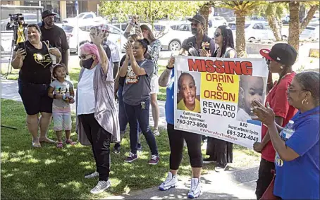  ?? PHOTOS BY ROD THORNBURG / FOR THE CALIFORNIA­N ?? The biological family of Orrin and Orson, along with supporters, let out whoops and cheers as reporters asked questions of people being interviewe­d. It was a moment of celebratio­n, but also relief for many to hear a final decision on the charges against Trezell and Jacqueline West. The couple was convicted Friday of murdering Orrin, but jurors couldn’t decide if they killed Orson.