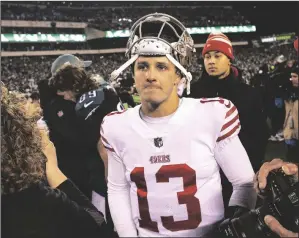  ?? KARL MONDON/BAY AREA NEWS GROUP ?? 49ers quarterbac­k Brock Purdy (13) leaves the field after a 31-7 loss to the Eagles in the NFC Championsh­ip Game on Sunday in Philadelph­ia.