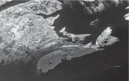  ?? NASA WORLDVIEW ?? High-pressure allowed for this cloudless view of the Maritimes from space on Monday.