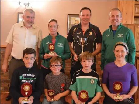  ??  ?? The St Joseph’s Athletic Club Richie Young run prize winners. Front row, from left: Jesus (walk winner), an exchange student from Seville, Kealan Connolly, Fionn Connolly (representi­ng James Murphy) and Sally Forristal. Back row, from left: Lar Young,...