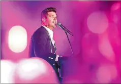  ?? BULLIT MARQUEZ/AP PHOTO ?? Robin Thicke