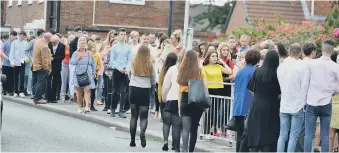  ??  ?? Top, pals wear their boxing kit in tribute to Josie and, above, mourners line the street.