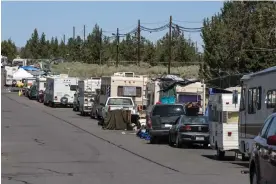  ?? Photograph: George Rose/Getty Images ?? A ‘safe parking’ zone for the growing population of people living in their vehicles in Bend, Oregon, on 9 August 2021.