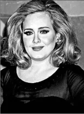  ?? JONATHAN SHORT/AP 2012 ?? Adele, whose last album was in 2011, created a stir Sunday with what appears to be a snippet of new music.