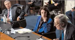  ?? BILL O’LEARY/GETTY ?? Sen. Dick Durbin, right, questions a witness before the Senate committee Thursday.