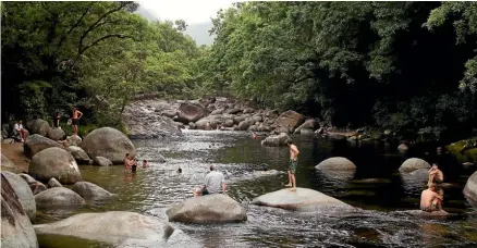  ?? Photo: GETTY IMAGES ?? Swimming in the Mossman river, which flows through the Daintree Rainforest.