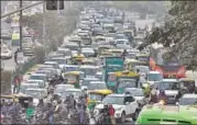  ?? RAJ K RAJ/HT ?? Traffic moves at a snail’s pace at the Pragati Maidan crossing in New Delhi on Monday.