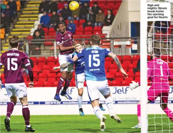  ??  ?? High and mighty: Djoum heads home the opening goal for Hearts