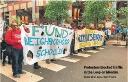  ?? FRAN SPIELMAN/ SUN- TIMES ?? Protesters blocked traffic in the Loop on Monday.