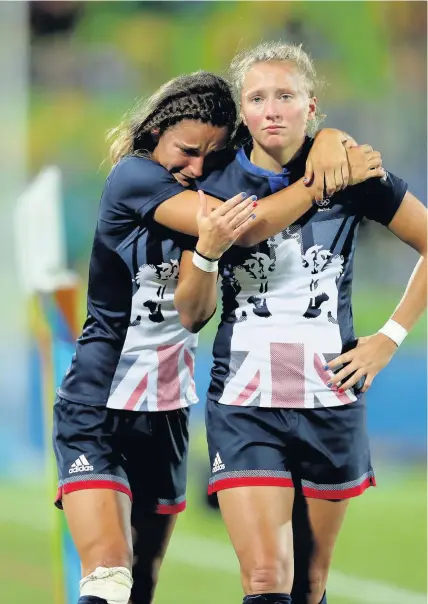  ??  ?? Great Britain’s Jasmine Joyce (left) and Emily Scott look dejected after losing the rugby sevens bronze medal match