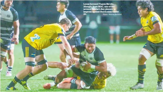  ?? Photo / Warren Buckand ?? Loose forward Tupou Ma’afu Afungia, from MAC, one of the
several Hawke’s Bay players to impress against Hurricanes Under 20.