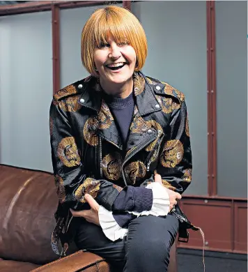  ??  ?? Mary Portas: abandoning the old corporate ways. Below, with wife Melanie