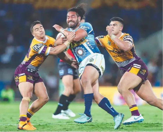  ?? Picture: GETTY IMAGES ?? Hot-and-cold centre Konrad Hurrell in action for the Titans against the Brisbane Broncos.