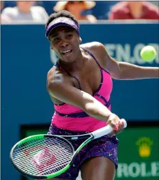  ??  ?? Venus Williams returns a shot to Camila Giorgi, of Italy, during the second round of the U.S. Open tennis tournament, on Wednesday, in New York. AP PhoTo/FrAnk FrAnklIn II