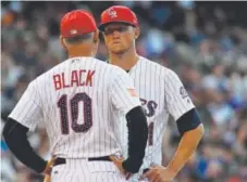  ?? John Leyba, Denver Post file ?? Rockies manager Bud Black chats with pitcher Kyle Freeland during a game last summer. This year, major-league teams will be limited in how many times they can visit the mound in a game. The limit doesn’t include pitching changes.