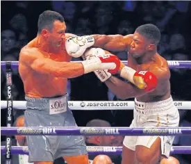  ??  ?? Anthony Joshua, right, in action against Wladimir Klitschko.