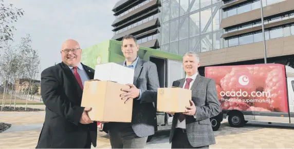  ??  ?? Coun Graeme Miller, leader of Sunderland City Council, left, with Ian Pattle, general manager - customer service and strategy at Ocado, centre, and Patrick Melia, council chief executive.