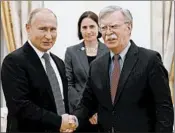  ?? ALEXANDER ZEMLIANICH­ENKO/AP ?? John Bolton, right, suggested no progress was made in talks with Vladimir Putin.