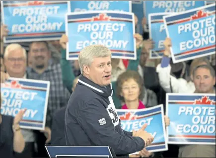  ?? RYAN REMIORZ/THE CANADIAN PRESS ?? Conservati­ve Leader Stephen Harper speaks to supporters at a rally Monday in Kamloops, B.C. Finance Canada released its 2014-15 numbers Monday and announced a surprise $1.9-billion federal surplus.