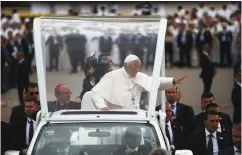  ?? (Pedro Nunes/Reuters) ?? POPE FRANCIS waves as he leaves the Chapel of the Apparition­s of Fatima in Portugal yesterday.